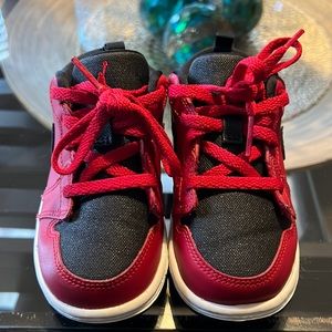 Boys size 8c black and red in color Nikes